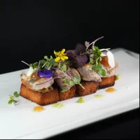 Tosta de corvina en Gran Viana, Barrio Gótico